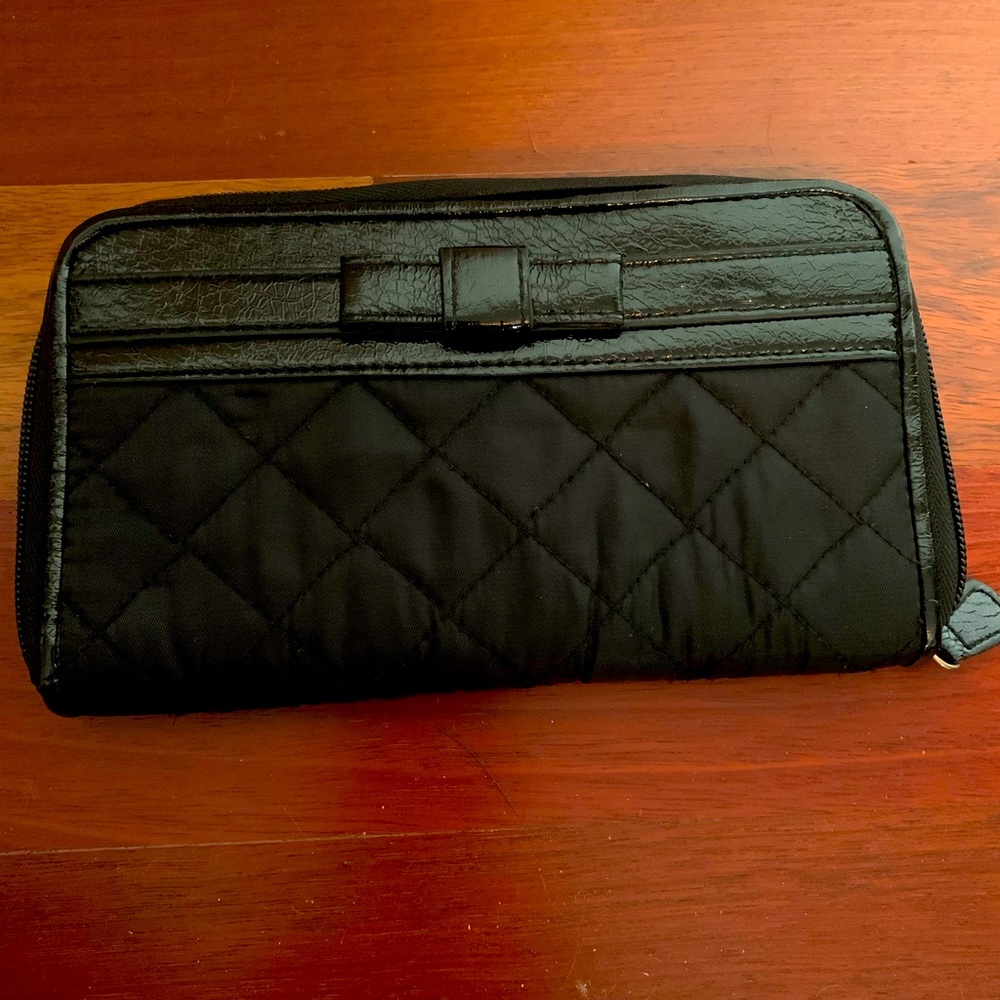 Cute patent leather and nylon wallet.